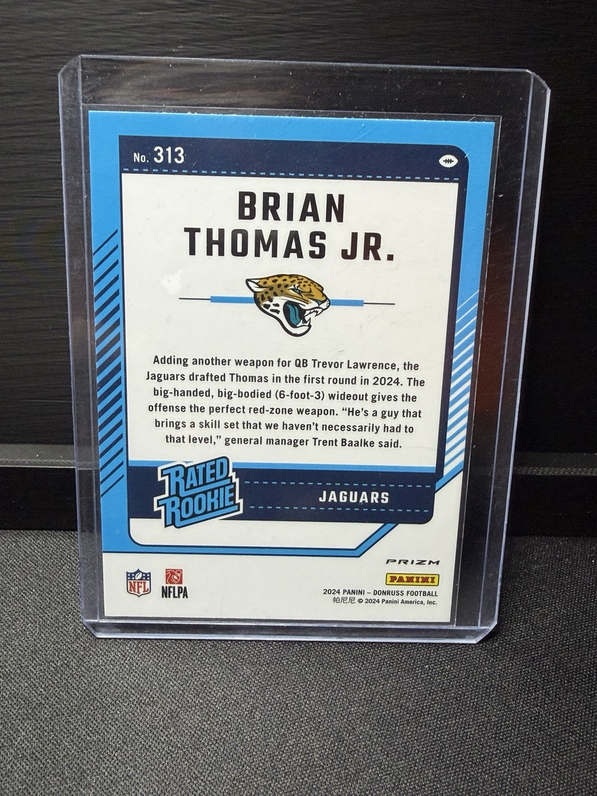 2024 Donruss Optic Brian Thomas Jr. red Pandora  Rated Rookie Prizm #313 Jaguars1