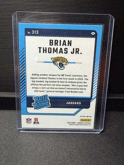 2024 Donruss Optic Brian Thomas Jr. red Pandora  Rated Rookie Prizm #313 Jaguars1
