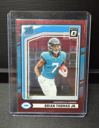 2024 Donruss Optic Brian Thomas Jr. red Pandora  Rated Rookie Prizm #313 Jaguars0