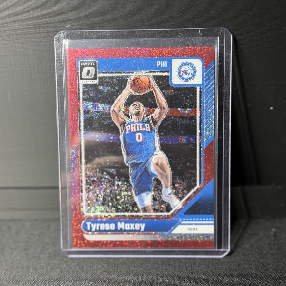 Panini 2024-25 Donruss Optic Tyrese Maxey #135 Red Glitter Prizm /75 76ers0